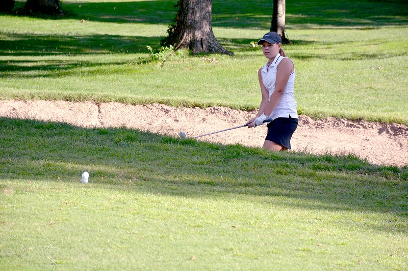 Graham Thomas/Siloam Sunday Siloam Springs junior golfer Amanda Glass and the Lady Panthers play Monday in the Class 6A State Golf Tournament held at Greystone Country Club in Cabot.