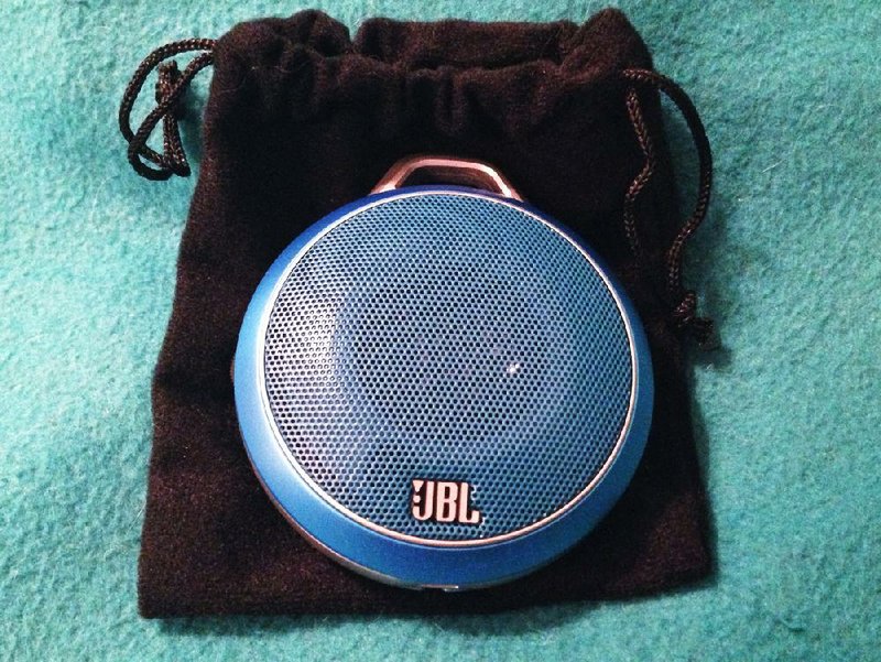 Special to the Arkansas Democrat Gazette - 09/26/2014 -  The JBL Micro Wireless Rechargeable Bluetooth Speaker includes a micro-USB charging cord and a velvet carrying bag (shown) and comes in several colors, including blue, red, pink and green. 
