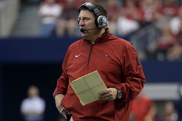 Arkansas head coach Bret Bielema watches play against Texas A&M during an NCAA college football game, Saturday, Sept. 27, 2014, in Arlington, Texas. (AP Photo/Tony Gutierrez)