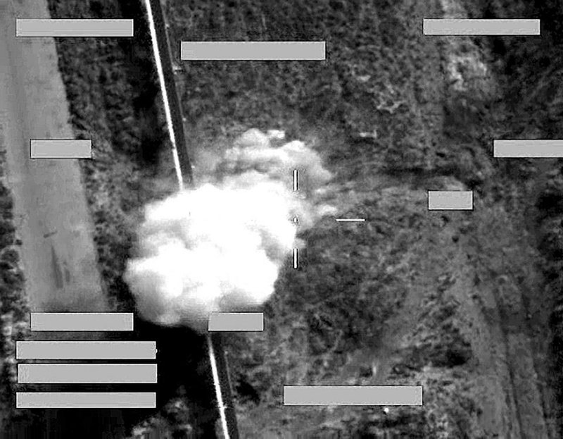 This screen shot provided by the British Ministry of Defense shows the second strike on an Islamic State group armed pick-up, using a Brimstone missile, in Iraq. As announced by British Defense Secretary Michael Fallon, Britain’s Royal Air Force jets conducted their first bombing strikes over Iraq on Tuesday.