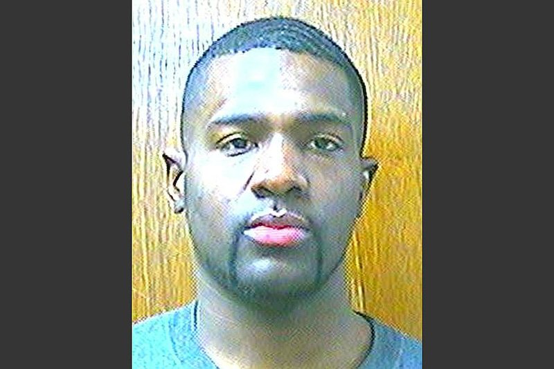 This March 25, 2013, file photo provided by the Oklahoma Department of Corrections shows Alton Nolen of Moore, Okla. Nolen was charged Tuesday, Sept. 30, 2014, with first-degree murder in the gruesome beheading of a Vaughan Foods worker, authorities said. 