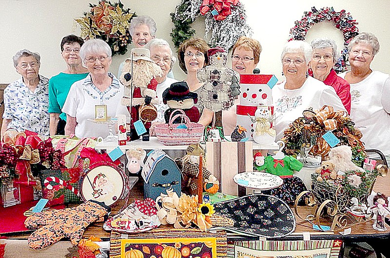 Submitted From left, Juanita Dittmer, Ev Weigel, Betty Reynolds, Barbara Brooks, Martha Hogue, Bette Cummings, Karen Roenfeld, Gladys Jutte, Nita Wallace and Judy Knadle show a variety of items that will be for sale during the United Methodist Women&#8217;s bazaar Oct. 4 at the First United Methodist Church of Bella Vista.