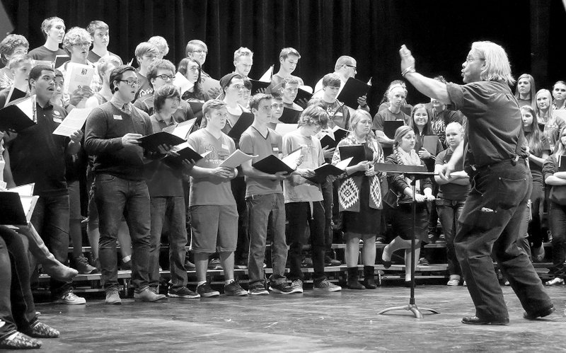 Photo by Randy Moll Rager H. Moore, choral director at the University of Arkansas, Ft. Smith, led a choir clinic for small high schools at Gentry on Saturday. The event was hosted by Gentry High School.