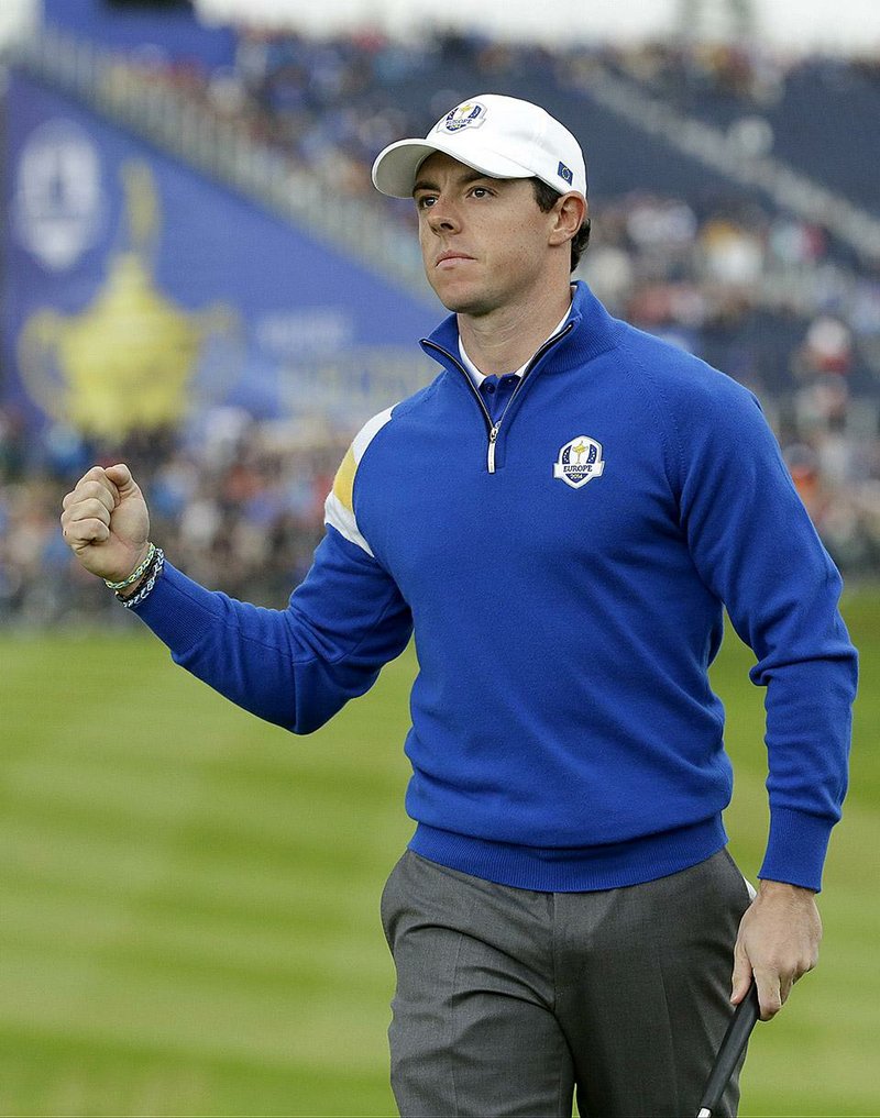 Europe’s Rory McIlroy celebrates on the 1st green to win the hole during the singles match on the final day of Ryder Cup golf tournament at Gleneagles, Scotland, Sunday, Sept. 28, 2014. 