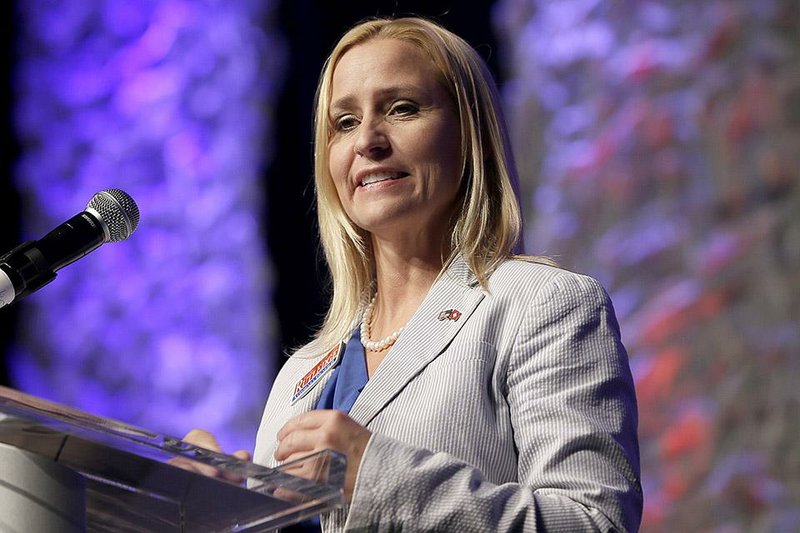 Leslie Rutledge, Republican nominee in the race for Arkansas attorney General, speaks at the Republican Party of Arkansas state convention in Hot Springs, Ark., Saturday, July 19, 2014. (AP Photo/Danny Johnston)