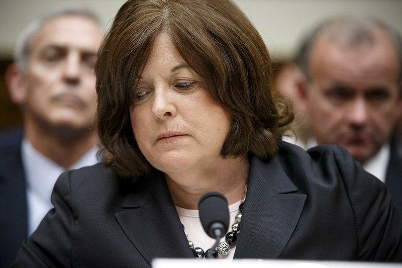 Julia Pierson pauses during her grilling Tuesday on Capitol Hill, during which she faced criticism by lawmakers from both parties.