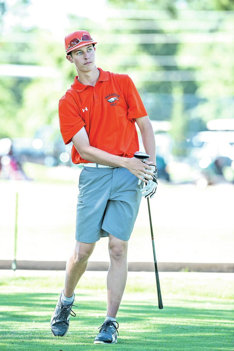 STAFF PHOTO PAUL BOYD Jacob Winkel, Rogers Heritage junior, has shown steady progress physically and mentally to become the War Eagles No. 1 golfer this season.