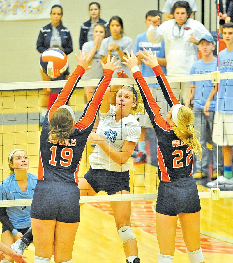 STAFF PHOTO MICHAEL WOODS Caroline Webb returns a serve against Rogers Hertiage on Sept. 18. Webb has 50 kills on the season for Har-Ber, which plays tonight at Bentonville.