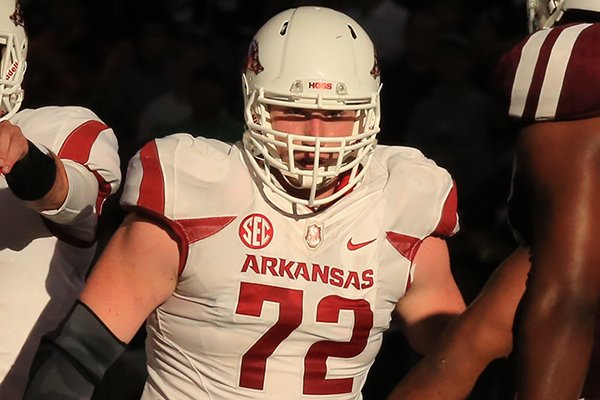 Arkansas center Frank Ragnow walks to the line of scrimmage during the fourth quarter of a game against Texas A&M on Saturday, Sept. 27, 2014 at AT&T Stadium in Arlington, Texas. 