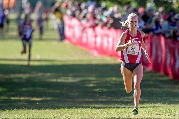 Arkansas junior Dominique Scott approaches the finish in the collegiate 8K on Saturday, Oct. 4, 2014, during the 26th annual Chile Pepper Cross Country Festival at Agri Park in Fayetteville. 