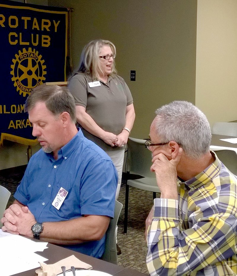 Photo submitted Marla Sappington, director of operations for The Manna Center, spoke to the Siloam Springs Rotary Club on Sept. 30 about the clients the center serves each day and the need for its services in Siloam Springs.