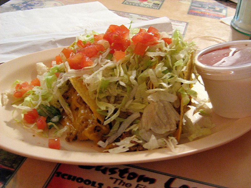 The taco plate at Bobby’s Cafe in North Little Rock includes three crispy beef tacos topped with cheese, lettuce and tomato.