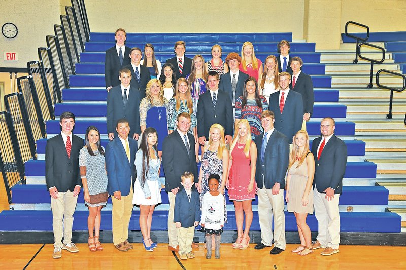 Courtesy Photo Lifetouch Rogers High School&#8217;s homecoming court is, first row, from left, John Sullivan, football bearer, and Janessa Katherine Ferguson, crown bearer, second row, from left, seniors Austyn Ayson, Brigette Daniel, Darrion Gentry, Evelyn Gonzalez, queen&#8217;s escort Trenton Lukassen, queen Rachel Young, Ashlyn Dunham, Townsend Wenzler, Carli Mareth and Billy Treacy, third row, from left, juniors Josh Stewart, Taylor Coberly, Sabra Ivey, Marek Swieter, Taylor Reese and Nathan Seldomridge, fourth row, sophomores Jeb Brain, Michelle Morales, Jessica Wallace, Jonathon O&#8217;Connor, Hannah Lueders, and Rhett Wallace, fifth row, from left, freshmen Andrew McGlynn, Jane Duru Townzen, Auguste Moisson, Nori Bunch, Molly Rebecca Thompson and Aaron Lockhart.