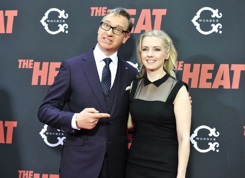 FILE - In this June 23, 2013 file photo, director Paul Feig and screenwriter Katie Dippold attend "The Heat" premiere at the Ziegfeld Theatre in New York. Feig said Wednesday, Oct. 8, 2014 that he will direct a reboot of "Ghostbusters," starring, as he said on Twitter, "hilarious women." Feig will direct the film for Sony Pictures, with Dippold writing the script. (Photo by Evan Agostini/Invision/AP, File)