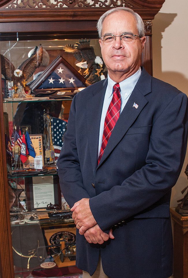 Retired Army Maj. Gen. Ron Chastain of Conway stands by a display of memorabilia from his years in the military. Chastain, who retired in 2010 as the deputy commanding general for the Arkansas Army National Guard at the U.S. Army Forces Command, will be inducted into the Arkansas Military Hall of Fame on Nov. 1.