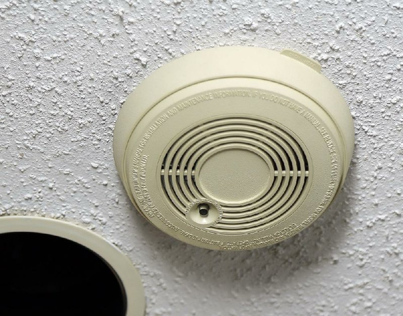 Arkansas Democrat-Gazette/JOHN SYKES JR. - Even the Little Rock Fire Department has a use for smoke detectors. 093014