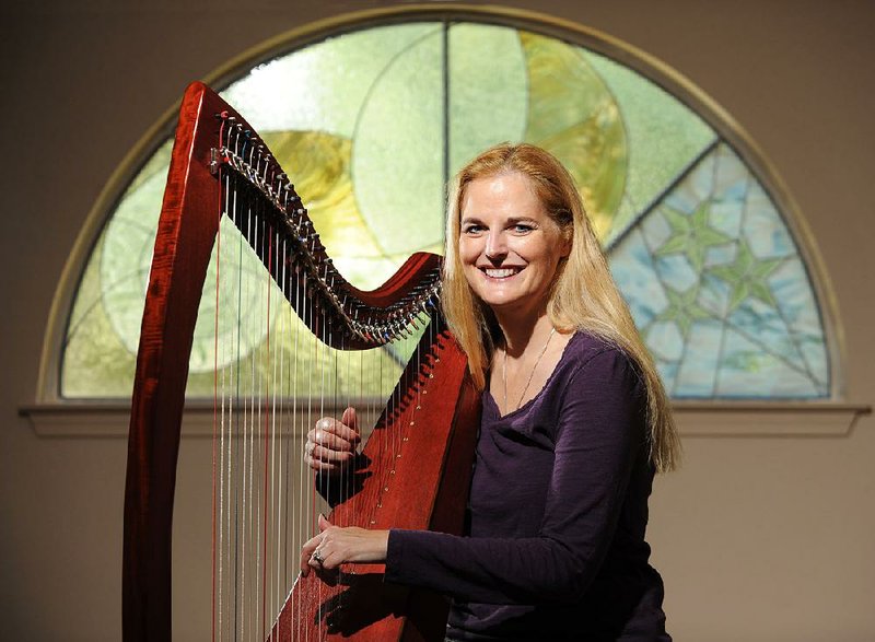 Beth Stockdell of Fayetteville is releasing her first CD of harp music and is planing to play a concert to benefit Hospice, where she volunteers. 