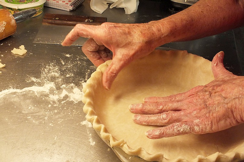 TIMES photographs by Annette Beard Jan Simrell&#8217;s hands scallop the edges of a pie crust deftly, the result of 70 years of practice.