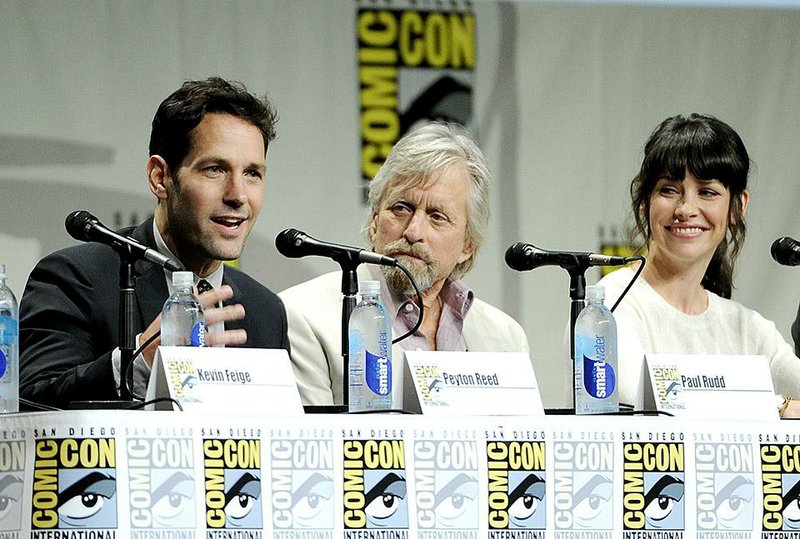 Paul Rudd, left, Michael Douglas, center, and Evangeline Lilly, cast members in the upcoming Marvel film "Ant-Man," take part in the Marvel panel at Comic-Con International on Saturday, July 26, 2014, in San Diego, Calif. (Photo by Chris Pizzello/Invision/AP)
