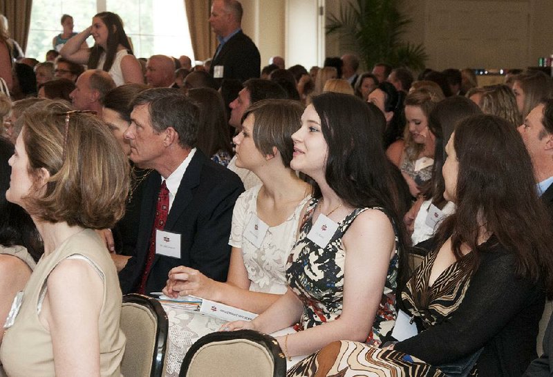 Arkansas Democrat Gazette/ CARY JENKINS August 2014: Anna Campbell and Lily Warren (center) at the Arkansas Heart Association's 2015 Sweethearts reception for participants and their parents. At 79, this is the largest Sweethearts class ever, by a far stretch.