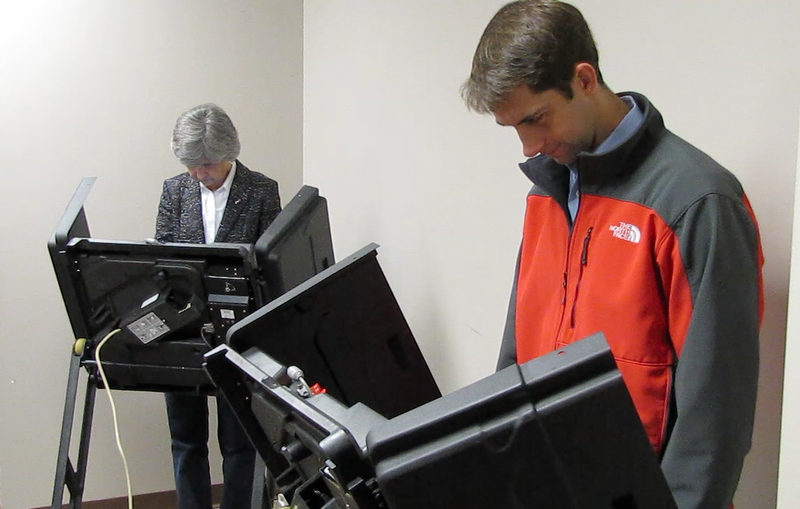 U.S. Rep. Tom Cotton votes early in Dardanelle alongside his mother, Avis Cotton.