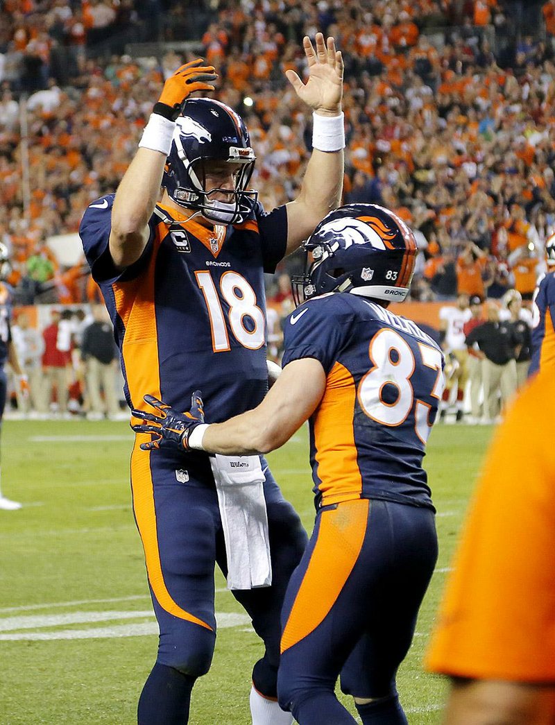 Manning sets TD passes record