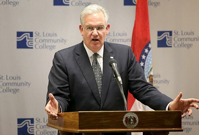 Missouri Gov. Jay Nixon, announcing a new commission Tuesday on issues in Ferguson, said the independent panel will have no role in the investigation of Michael Brown’s death. 