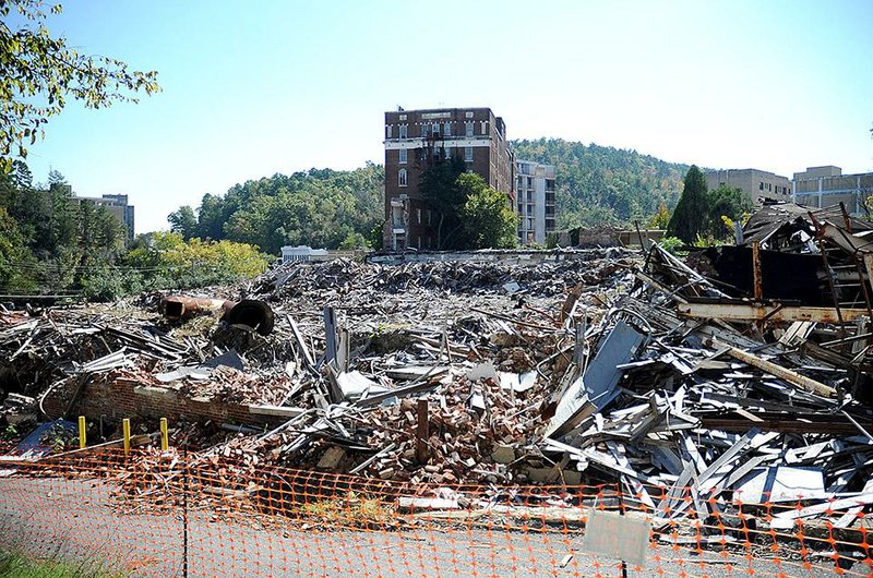 Rubble from the Majestic Hotel after a February fire remains strewn about Wednesday on the Hot Springs site where the historic hotel once stood.