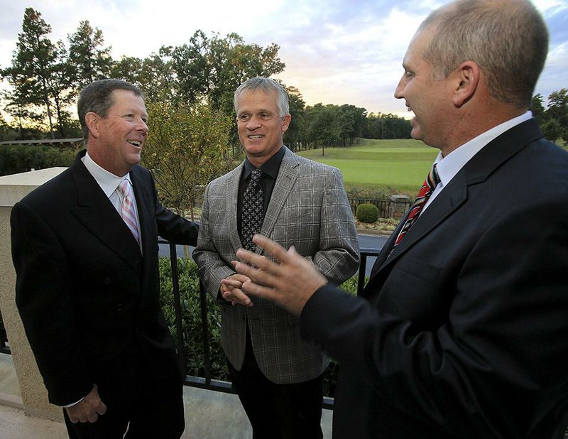  Arkansas Democrat-Gazette/STATON BREIDENTHAL --10/23/14-- ASGA Hall of Fame inductees Glen Day (left) Barry Howard (middle) and Wes McNulty Thursday night at Chenal Country Club before the Hall of Fame banquet.