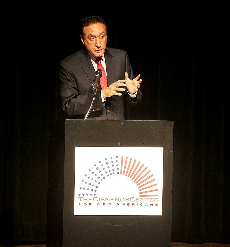 NWA Media/Michael Woods --10/23/2014-- w @NWAMICHAELW...Henry Cisneros, a one-time U.S. Secretary of Housing and Urban Development, speaks to University of Arkansas students and faculty Thursday 
afternoon at the Union Theatre in Fayetteville.
His talk described efforts involving his new immigration-focused Cisneros Center, a non-profit organization that has a pilot project in northwest Arkansas.