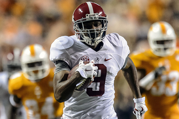 Alabama wide receiver Amari Cooper (9) catches a pass against