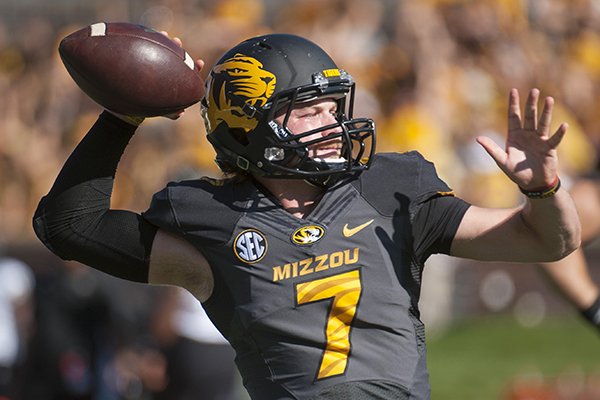 Missouri quarterback Maty Mauk throws a pass as he warms up before the start of an NCAA college football game against Vanderbilt, Saturday, Oct. 25, 2014, in Columbia, Mo. (AP Photo/L.G. Patterson)