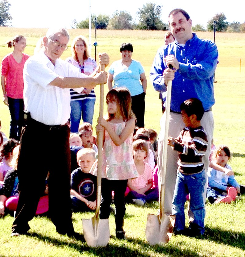 Submitted Photo The Decatur School District broke ground on the new safe room at Northside Elementary Oct. 16. On hand to turn dirt were Decatur Mayor Charles Linam, Maddison Sewell, Anderson Lopez and Northside principal Cary Stamps.