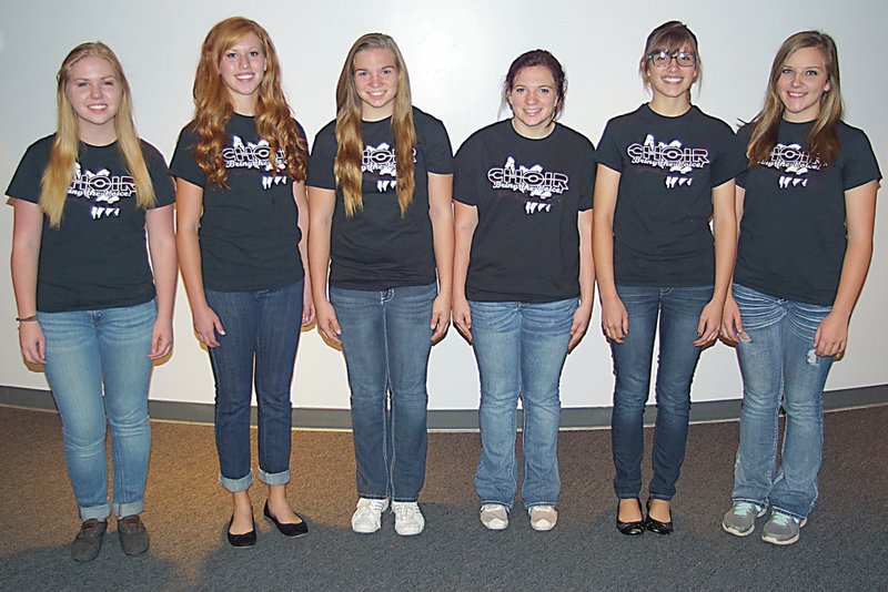 Photo by Randy Moll Alex Savage (left), Mallory Morris, Ashlyn Riggs, Kyla Riggs, Caitlyn Cox, Krystin Cox and Audra Weathers (not pictured) qualified for all-region choir on Oct. 4.