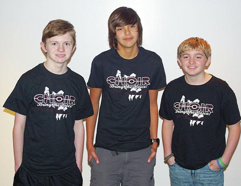 Photo by Randy Moll Gentry Middle School students Jackson McAfee, Andrew Reynoso and Jonathan Brinkley qualified for the junior high all region choir on Oct. 18.