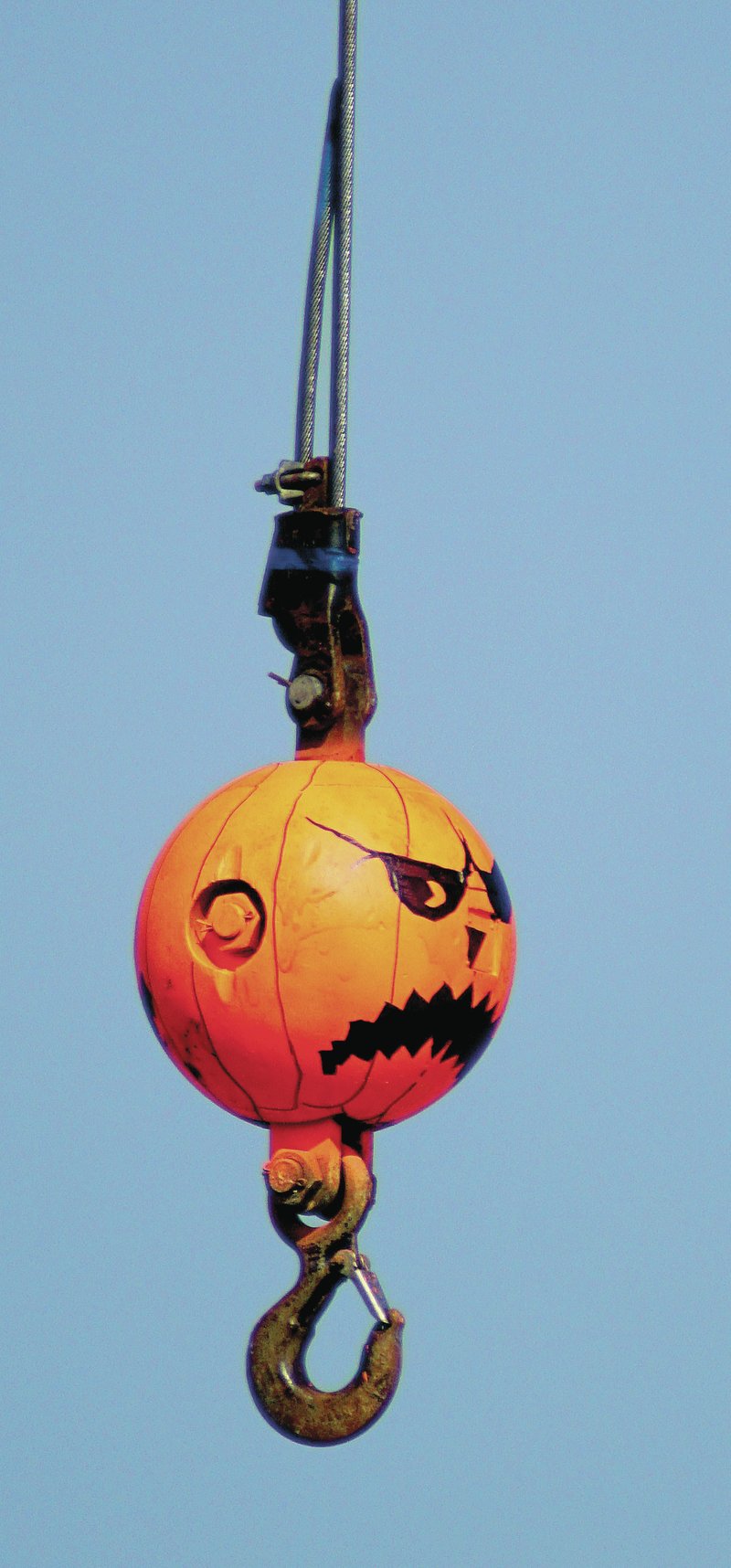 Photo by Randy Moll The weight on a crane at SWEPCO&#8217;s construction storage area near Gentry reflects a bit of the Halloween spirit.