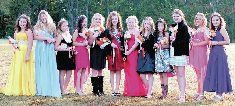 Photo by Maria Holloway Gravette sixth grade pee wee cheerleaders had their annual homecoming coronation on Oct. 18. The queen was Brittany May and all other girls were crowned as princesses. They are pictured above: Emmalee McFall (left), Sky Butler, Lily Dodge, Andrea Rigas, Rylee Brewer, Queen Brittany May, Rebecca James, Patience Campbell, Kearstin Holland, Abigail Beranek, Jessica Price and Tiffany Rusher.