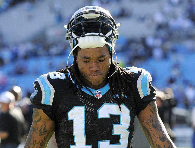 Wide receiver Kelvin Benjamin said he purposely ran a slower than usual time in the 40-yard dash to enhance his chances of being drafted by the Carolina Panthers.