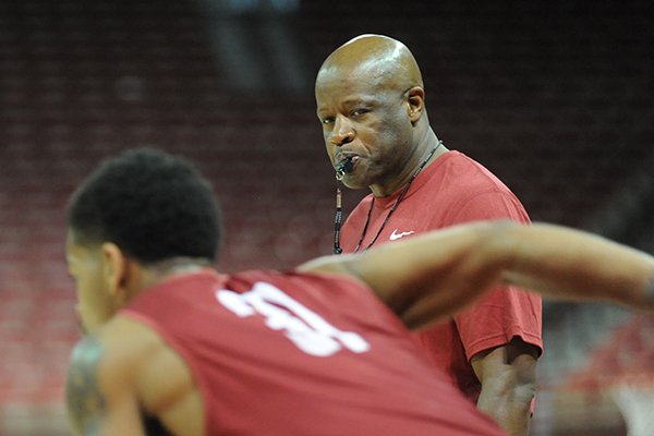 Arkansas coach Mike Anderson watches his players during practice Monday, Oct. 27, 2014, at Bud Walton Arena in Fayetteville.