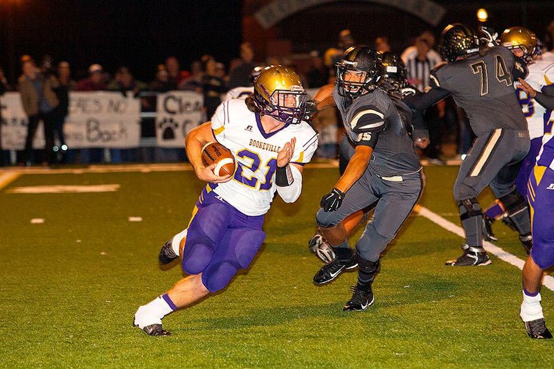#21 Bryson May of Booneville gets some running room against the Charleston defense on his way to a first half TD.