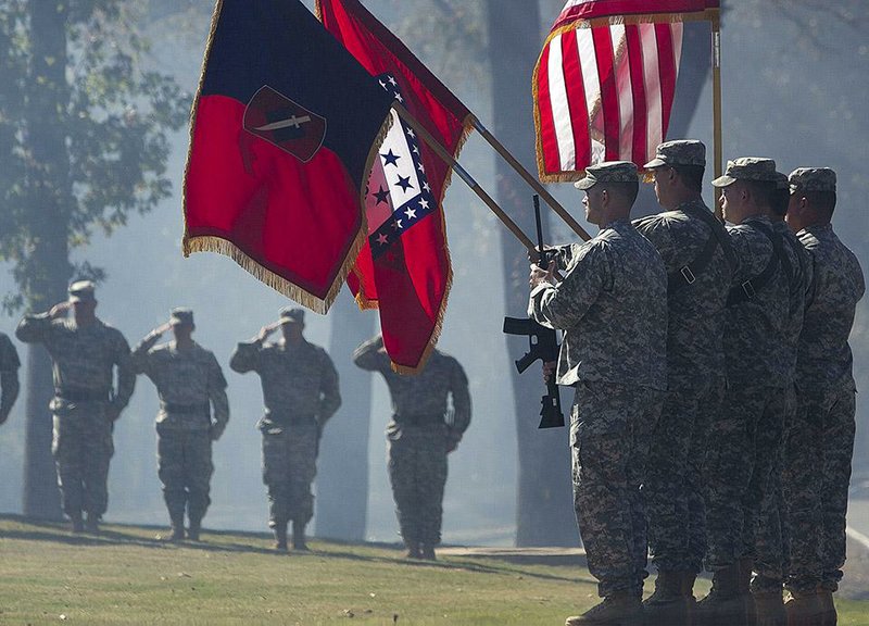 Arkansas Democrat-Gazette/BENJAMIN KRAIN --11/1/2014--
Members of the 39th Infantry Brigade Combet Team participate in a Change of Command Ceremony at Camp Robinson in North Little Rock on Saturday. Col. Michael E Spraggins replaced Col. John Mickey Stewart as the new Commander of the 39th Brigade which has over 40 units located across the state.