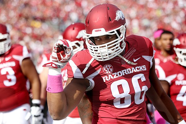 Arkansas defensive end Trey Flowers warms up prior to a game against Georgia on Saturday, Oct. 18, 2014 at War Memorial Stadium in Little Rock. 