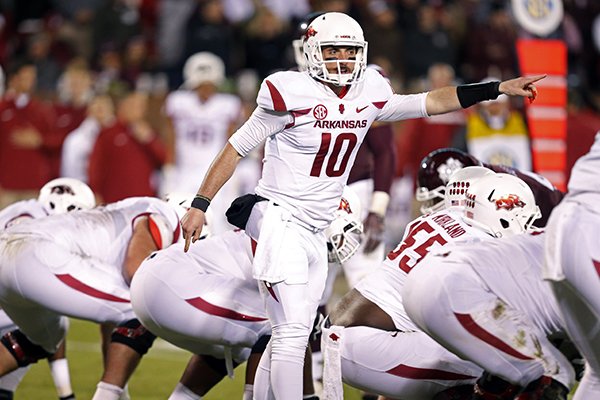 Arkansas quarterback Brandon Allen (10) calls out signals against Mississippi State in the first half of an NCAA college football game in Starkville, Miss., Saturday, Nov. 1, 2014. No. 1 Mississippi State won 17-10. (AP Photo/Rogelio V. Solis)