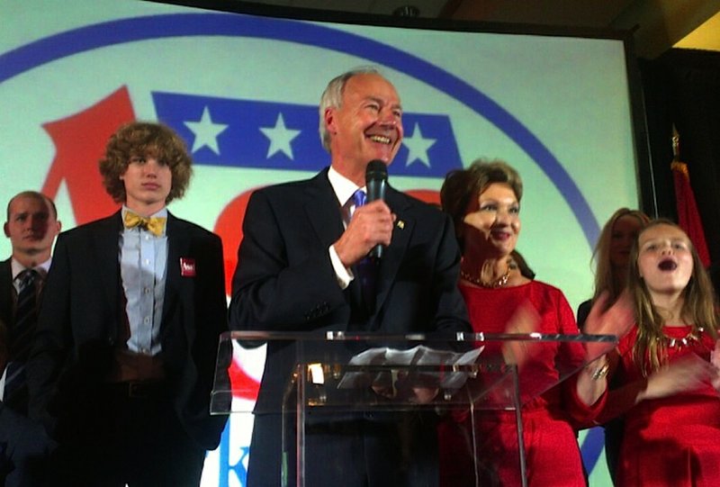 Republican Asa Hutchinson accepts victory in the race for Arkansas governor Tuesday evening at the Embassy Suites in Little Rock.