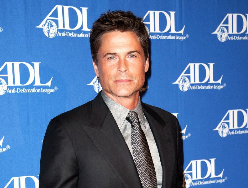 FILE - In this Oct. 16, 2012 file photo, actor Rob Lowe attends the Entertainment Industry Awards Dinner at the Beverly Hilton Hotel in Beverly Hills, Calif. Lowe stars in ads for DirecTV encouraging people to switch from cable. (Photo by Richard Shotwell/Invision/AP, File)