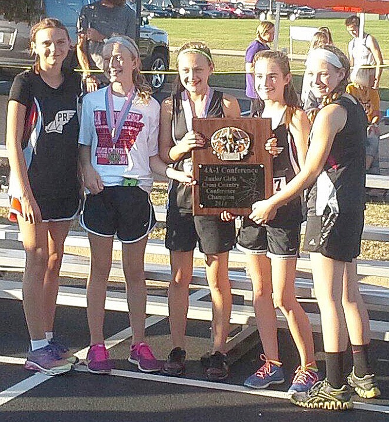 Photographs submitted The Junior High Lady Blackhawks won first place overall at the District Cross Country meet recently, according to coach Heather Wade.