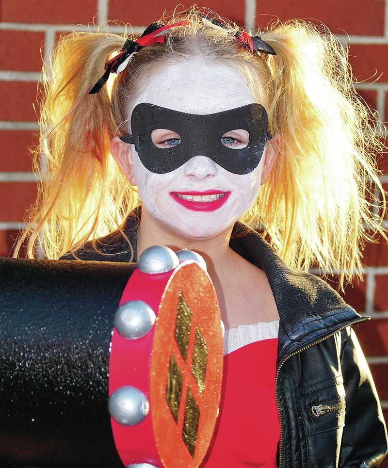 Photo by Randy Moll Madison Noll, 8, appeared in colorful costume on Friday along Gentry&#8217;s Main Street for the annual Halloween Trick or Treat on Main Street event sponsored by the Gentry Chamber of Commerce. For more photos of the event, see Faces of Halloween on Page 1B.