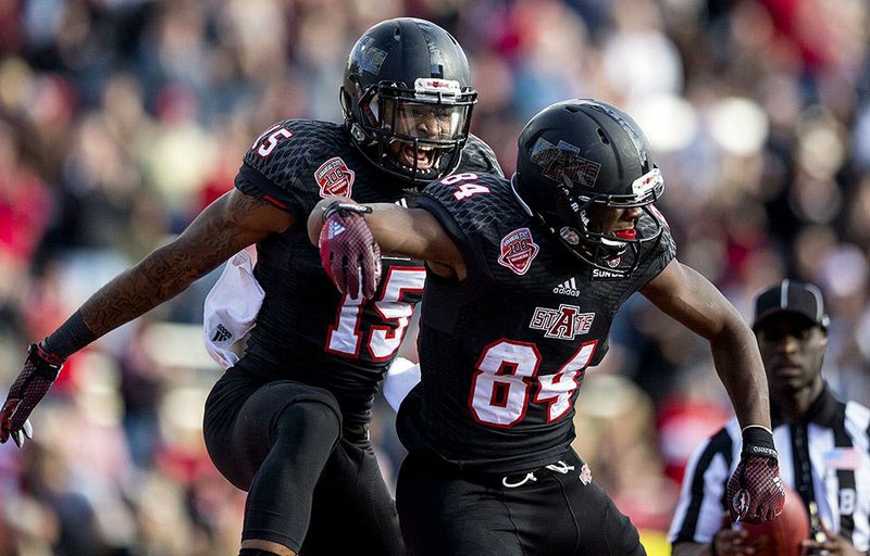 Arkansas Democrat-Gazette/MELISSA SUE GERRITS - 11/08/2014 - ASU's Tres Houston, left, celebrates team mate Dijon Paschal's touch down during their game against South Alabama at ASU in Jonesboro November 8, 2014. 