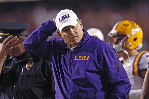 LSU head coach Les Miles walks off the field at halftime during an NCAA college football game against Alabama in Baton Rouge, La., Saturday, Nov. 8, 2014. (AP Photo/Jonathan Bachman)