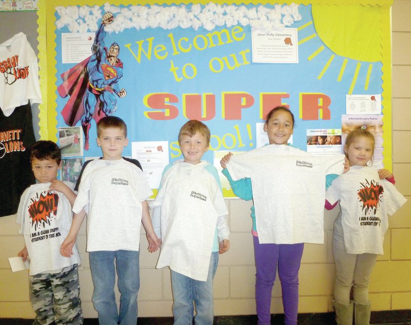 Submitted Photo Glenn Duffy Elementary PAWS Students of the Month for November are pictured: Daniel Walker (Gravette), Carson Williamson (Bella Vista), Jake Goodall (Gravette), Alyssa Ogborn (Bella Vista), and Neveah Cole (Gravette). Yarelii Cruz (Gravette) was absent at the time of the photo.